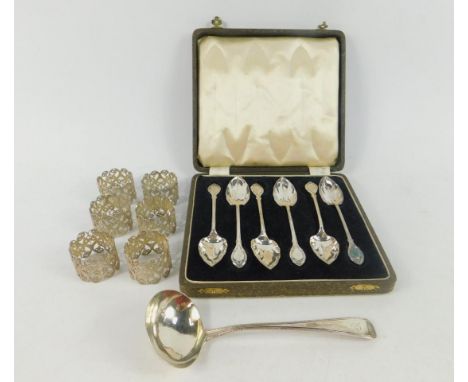A George III silver cream ladle, initial engraved, Soloman Houghman, London 1804, 1.48oz, six Continental filigree napkin rin