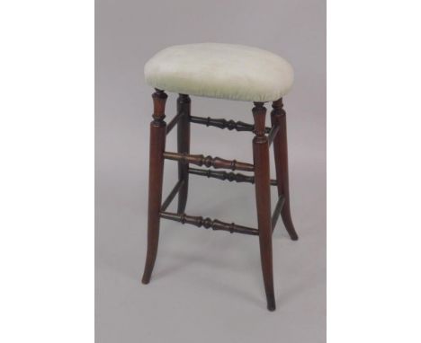 A Victorian rosewood stool, with overstuffed seat, raised on four outswept legs united by turned stretchers, 58cm high.