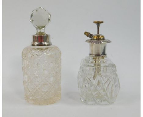 A George V cut glass and silver atomiser, with engine turned decoration, 1934, and an Edward VII cut glass scent bottle and s