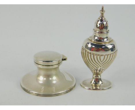 A George V Loaded silver capstan inkwell, Birmingham 1911, and an Edward VII semi fluted silver pepperette, Birmingham 1907, 