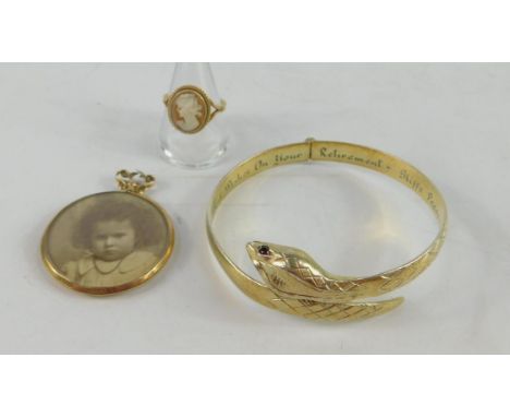 A 9ct gold and cameo ring, bust portrait of a lady, size P, a 9ct gold photo locket, 9.6g all in, and a 22ct gold plated serp