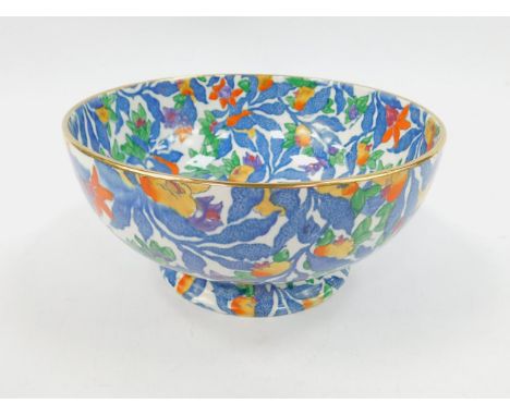 A Barker Brothers early 20thC pottery faint bowl, printed in blue and enamel decorated with fruit and blossom, printed mark, 