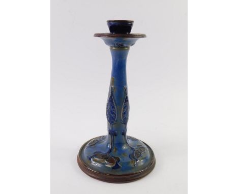 A Royal Doulton late 19thC stoneware candlestick, converted to a table lamp, decorated with Art Nouveau floral motifs against