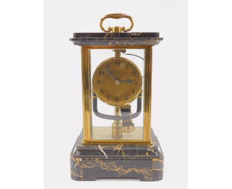 A Bulle Clockette brass and veined black marble electric mantel clock, converted to battery, brass circular dial bearing Arab