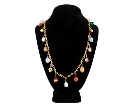AN ANTIQUE RUSSIAN GOLD NECKLACE WITH NINETEEN JEWELED, HARDSTONE AND ENAMEL EGG PENDANTS, VARIOUS MAKERS INCLUDING AUGUST HO