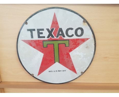 A vintage American hard enamel Texaco, circular tin advertising wall sign, 38cm diameter