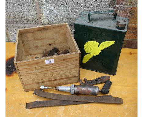 An assortment of tools for a W O Bentley along with a Shell petrol can