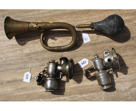 A Lucas 'Aceta' acetylene bicycle lamp, and one other 'Panther' lamp and a vintage style brass and rubber car horn