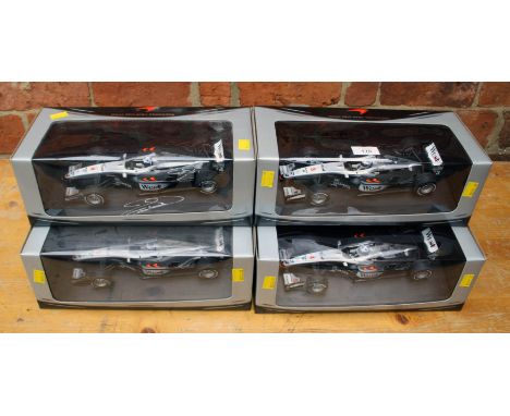 A collection of four Minichamps 1:18 scale, ltd edition McClaren Mercesdes F1 class one signed by the driver