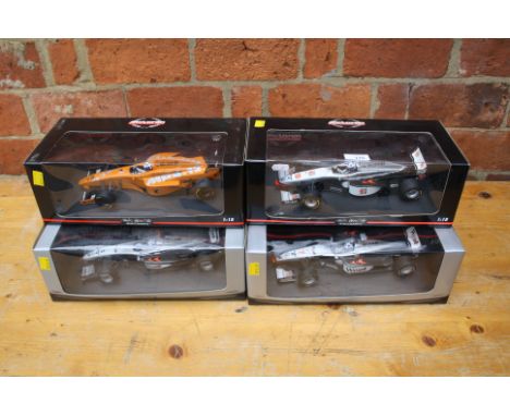 A collection of four Minichamps 1:18 scale, ltd edition McClaren Mercesdes F1 class, unsigned >180.