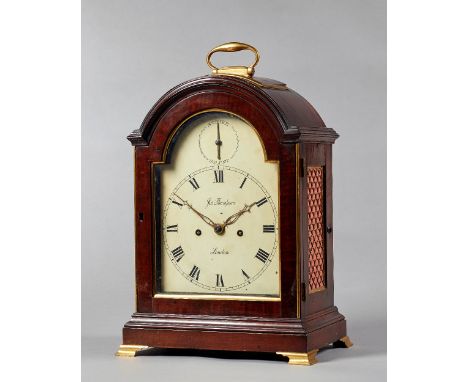 A George III mahogany and gilt brass-mounted bracket clockSigned Joseph Thompson, London, circa 1800The case with a broken ar