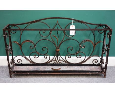 A 19th century French wrought iron stick stand, with gilt leaf decoration, 120cm x 72cm high x 20cm deep.