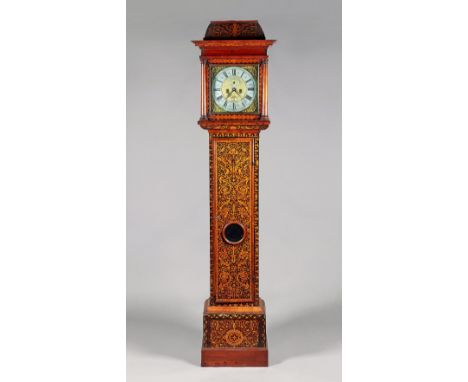  A Queen Anne walnut and arabesque marquetry longcase clockJohn Gammon, London, the case circa 1710 and laterThe hood with a 