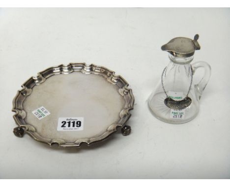 Silver and silver mounted wares, comprising; a shaped circular waiter, having a Chippendale style border, raised on three scr