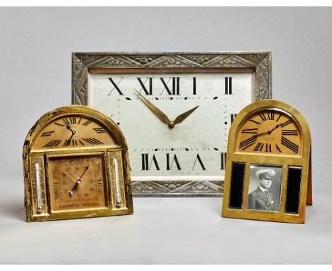 A large French silvered metal rectangular desk timepieceCouaillet movement, circa 1920The cast frame with bevelled glass pane