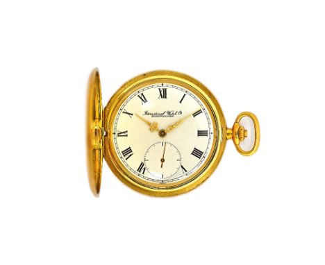 An International Watch Co 18ct gold cased, keyless wind, hunting cased dress watch, with a signed jewelled lever movement, 18