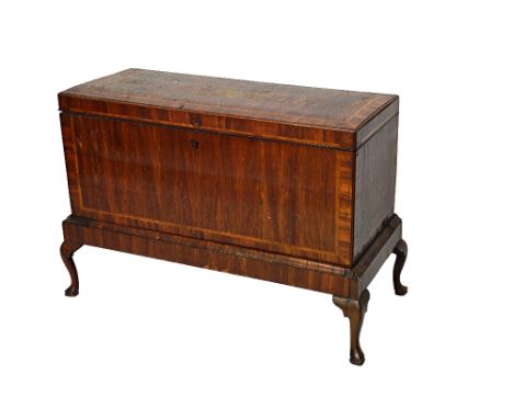 An early 18th century chevron banded cherry wood rectangular lift-top trunk on stand, 113cm wide x 80cm high.  