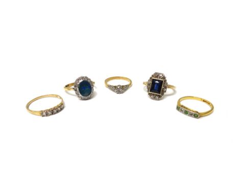 A gold and platinum, diamond and opal doublet oval cluster ring, detailed 18 CT PLAT, a gold, diamond and synthetic sapphire 