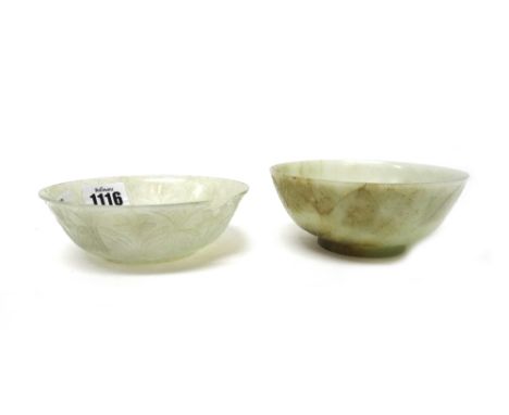 A pale celadon jade bowl, probably Chinese for the Mughul market, 17th/18th century, the gently flared sides carved with lapp