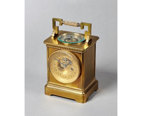 A French brass combination mantel clockCirca 1890In the form of an oversized carriage clock, the shaped handle above a circul