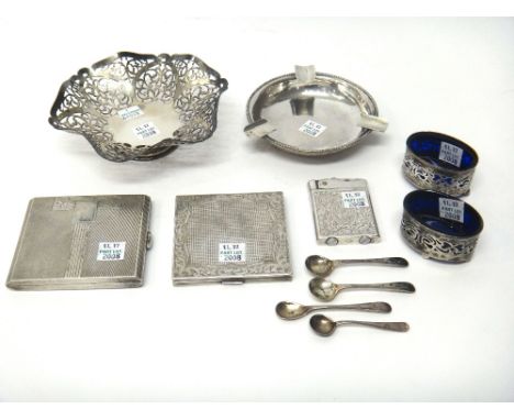 Silver, comprising; a shaped hexagonal bonbon dish, having scroll pierced decoration, Birmingham 1972, four condiment spoons 