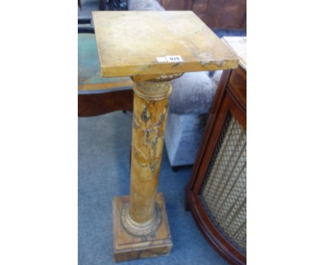 An ormolu mounted Sienna marble pedestal  with square top over a circular tapering centre and square base, 107cm high. 