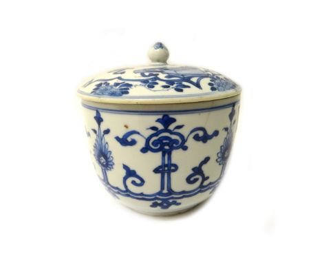 A Chinese blue and white bowl and a matching cover, Kangxi, the bowl painted with ruyi heads, flower motifs and scrolls, the 
