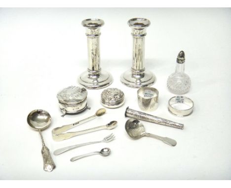 Silver and silver mounted wares, comprising; a pair of candlesticks, each on a circular base, loaded, Birmingham 1912, height