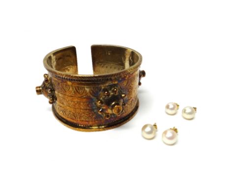 A pair of gold and cultured pearl earstuds, with post and butterfly clip fittings, detailed 750, another pair of gold and cul