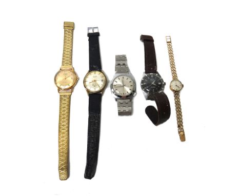 A Tudor Royal 9ct gold lady's bracelet wristwatch, the signed circular dial with gilt Arabic and arrow shaped numerals, the 9