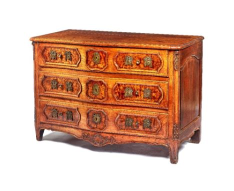 An 18th century French walnut and burr ash serpentine three drawer commode, with shell carved lower frieze, 127cm wide x 85cm