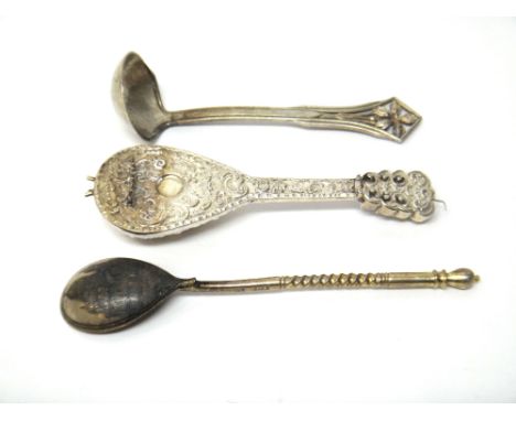 A Russian teaspoon, the back of the bowl niello decorated with a view of a church, the stem with spiral decoration, probably 