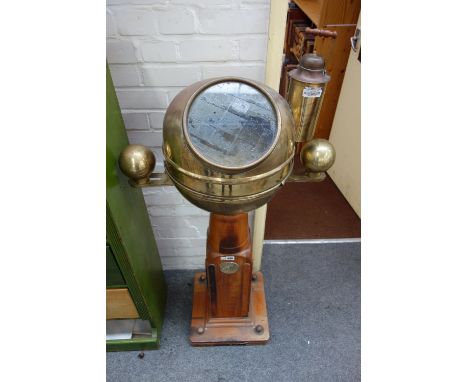 A ship's binnacle, by Solver & Svarrer, early 20th century, with brass hood and oil lamp over a gimble mounted compass and oa
