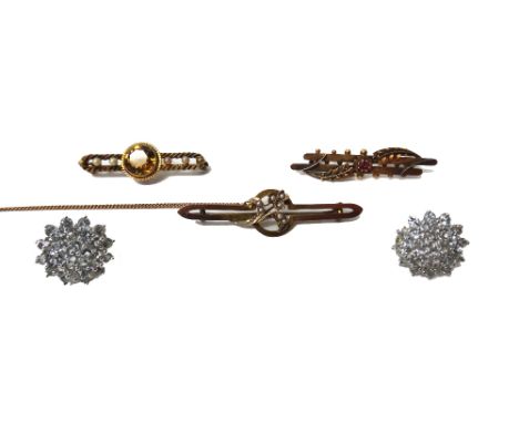 A 15ct gold and ruby single stone bar brooch, having foliate spray motifs, a gold, citrine and seed pearl bar brooch, detaile