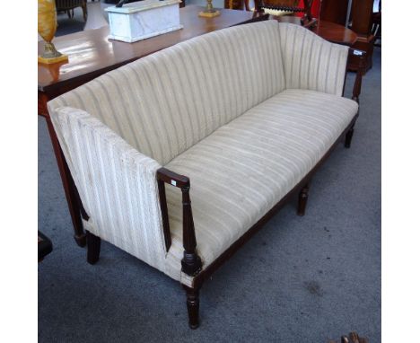 A Regency mahogany hump back sofa, with bow seat and reeded supports, 186cm wide x 86cm high x 80cm deep.