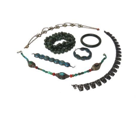 A collection of Eastern and other jewellery, comprising; two turquoise matrix bracelets, a circular green stone bangle, a sin