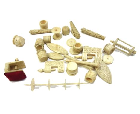 A quantity of Chinese export ivory sewing accessories, circa 1900 mostly florid carved including; needle cases, spools, threa