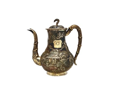 A Chinese composite four piece tea and coffee set, comprising; a teapot, a coffee pot, a twin handled lidded sugar bowl and a