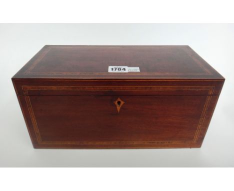 A Regency inlaid mahogany rectangular tea caddy, with twin lidded interior, 31cm wide x 15cm high x 15cm deep.