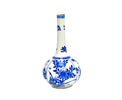 A Chinese blue and white bottle vase, Kangxi, the bulbous body painted with panels of Precious Objects alternating with panel