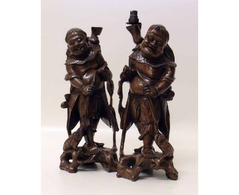 Pair of Chinese root wood lamp bases in the form of Fishermen. Condition report: see terms and conditions