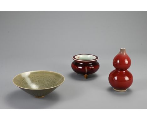 A GROUP OF CHINESE CERAMIC ITEMS. To include a Chinese Yaozhou type conical bowl with carved peony decoration and vertical ri