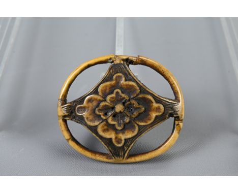 A JAPANESE STAG ANTLER RYUSA NETSUKE, 19TH CENTURY OR EARLIER. Circular openwork section with floral motif. 4.5cm wide.With f