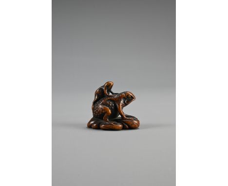 JAPANESE EDO PERIOD BOXWOOD NETSUKE OF TWO TOADS, with the mother carrying her young on her back. unsigned, height 4.5 cm x w