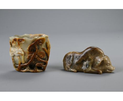 TWO CHINESE NEPHRITE JADE CARVINGS, MING OR LATER. To include a libation cup carved in relief with lingzhi leading into an op