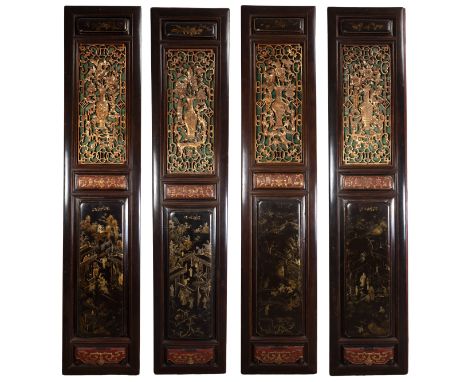 A SET OF FOUR MONUMENTAL CHINESE CARVED WOOD DOOR PANELS, LATE QING / REPUBLIC PERIOD. Each of tall rectangular form insert w