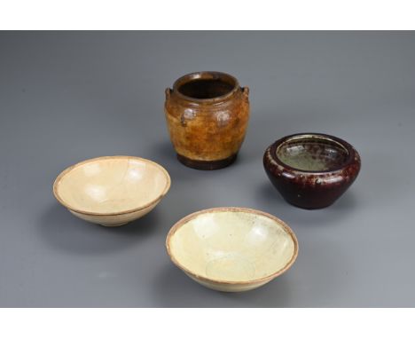A GROUP OF CHINESE POTTERY ITEMS, SONG DYNASTY AND LATER. To include two Qingbai ware bowls, one with hand written characters