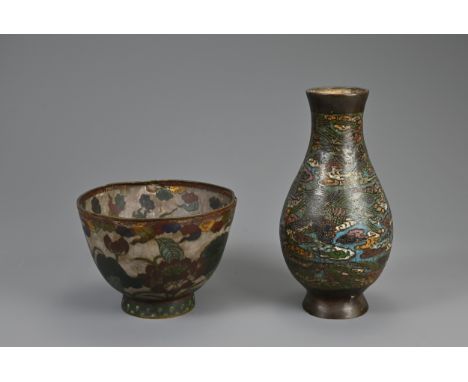 TWO JAPANESE METALWARE ENAMEL ITEMS, 19TH CENTURY. To include a champleve baluster form vase decorated with phoenixes in clou