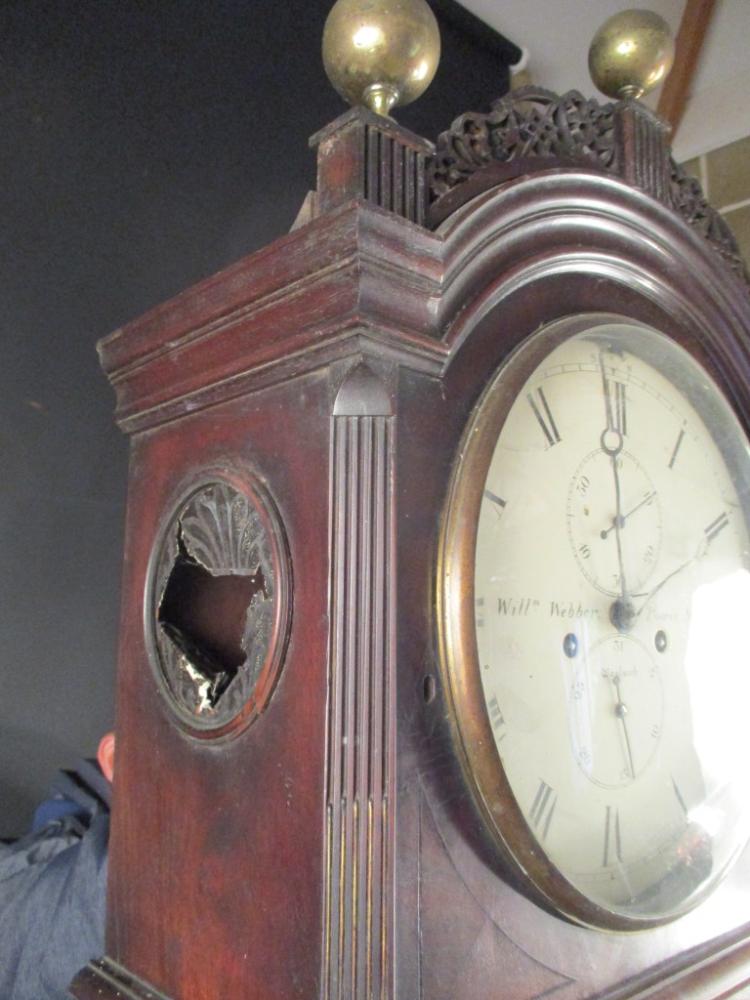 A Regency mahogany longcase clock, the hood with fretwork cresting and