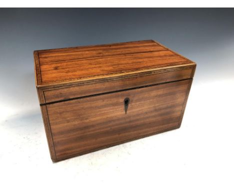 A George III satinwood tea caddy, the crossbanded hinged rectangular top opening to reveal twin compartments within 13 x 22.5